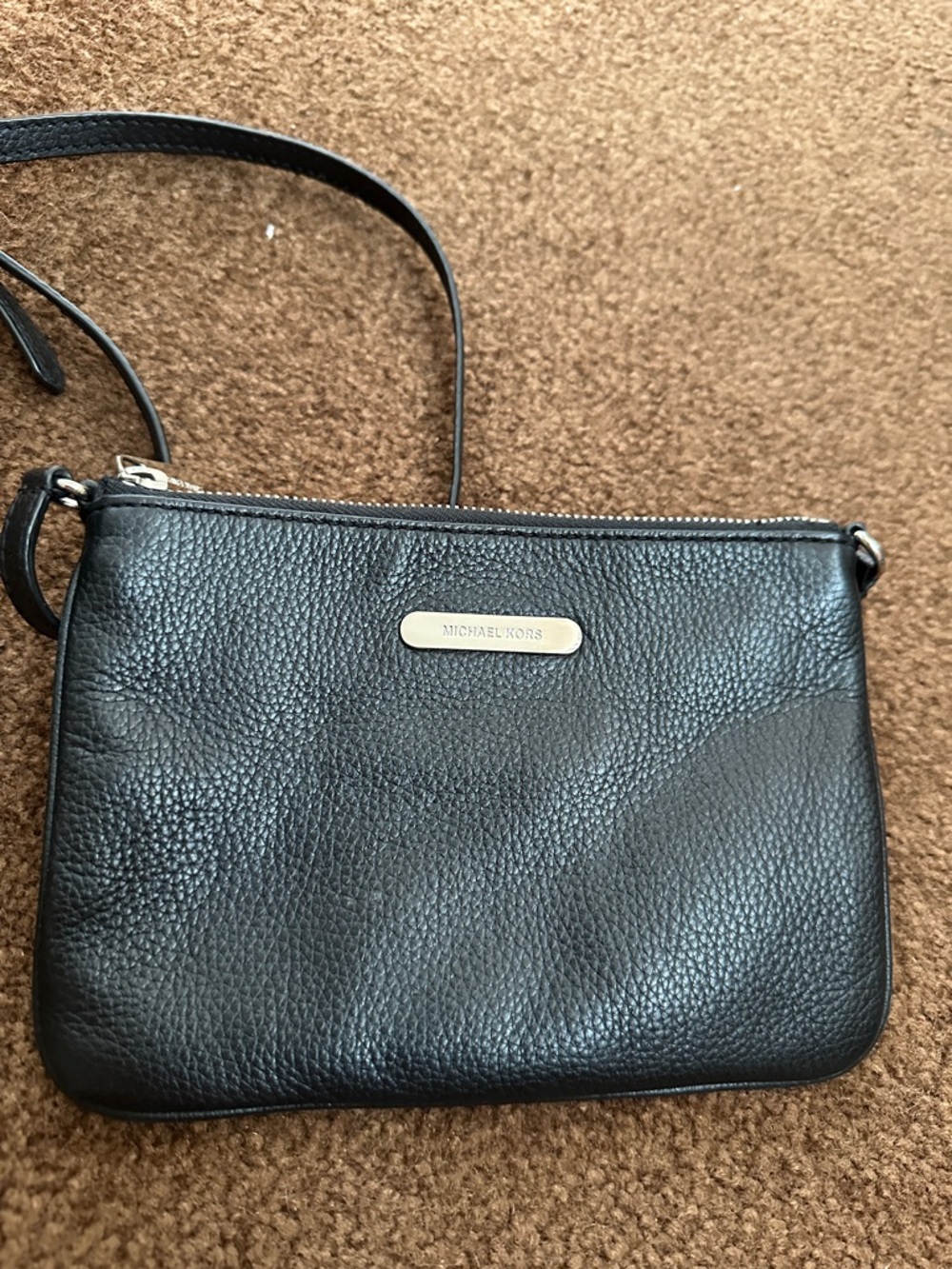 Michael Kors Black Pebbled Leather Crossbody with Gold Logo Plaque